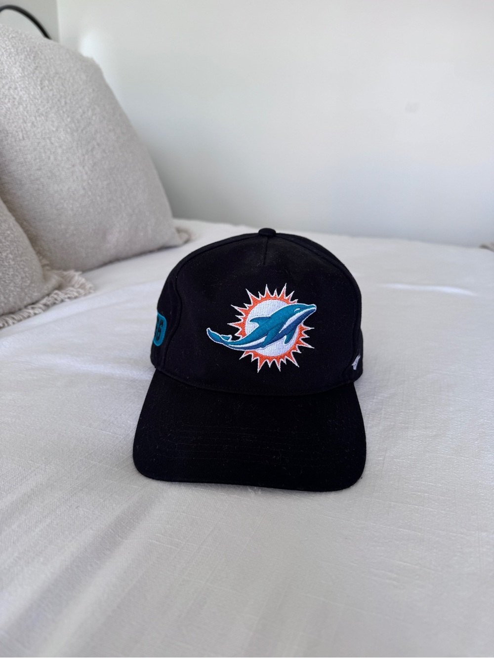 Miami Dolphins Black Snapback Hat with Teal & Orange Logo